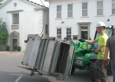 Workers replacing HVAC at Woodford County project