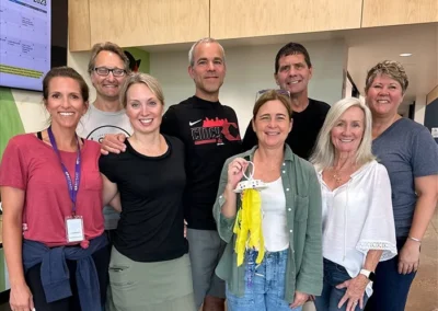 Group of Perfection team volunteering at Bethany's House