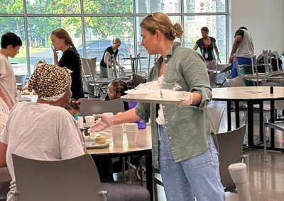 Perfection team member helping at Bethany's House