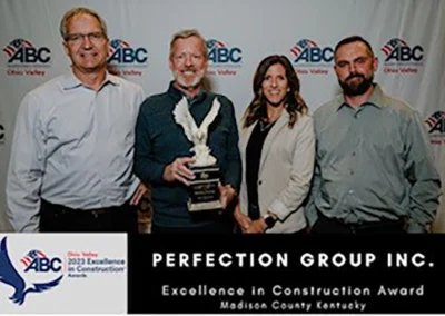 Perfection team accepting the Eagle award